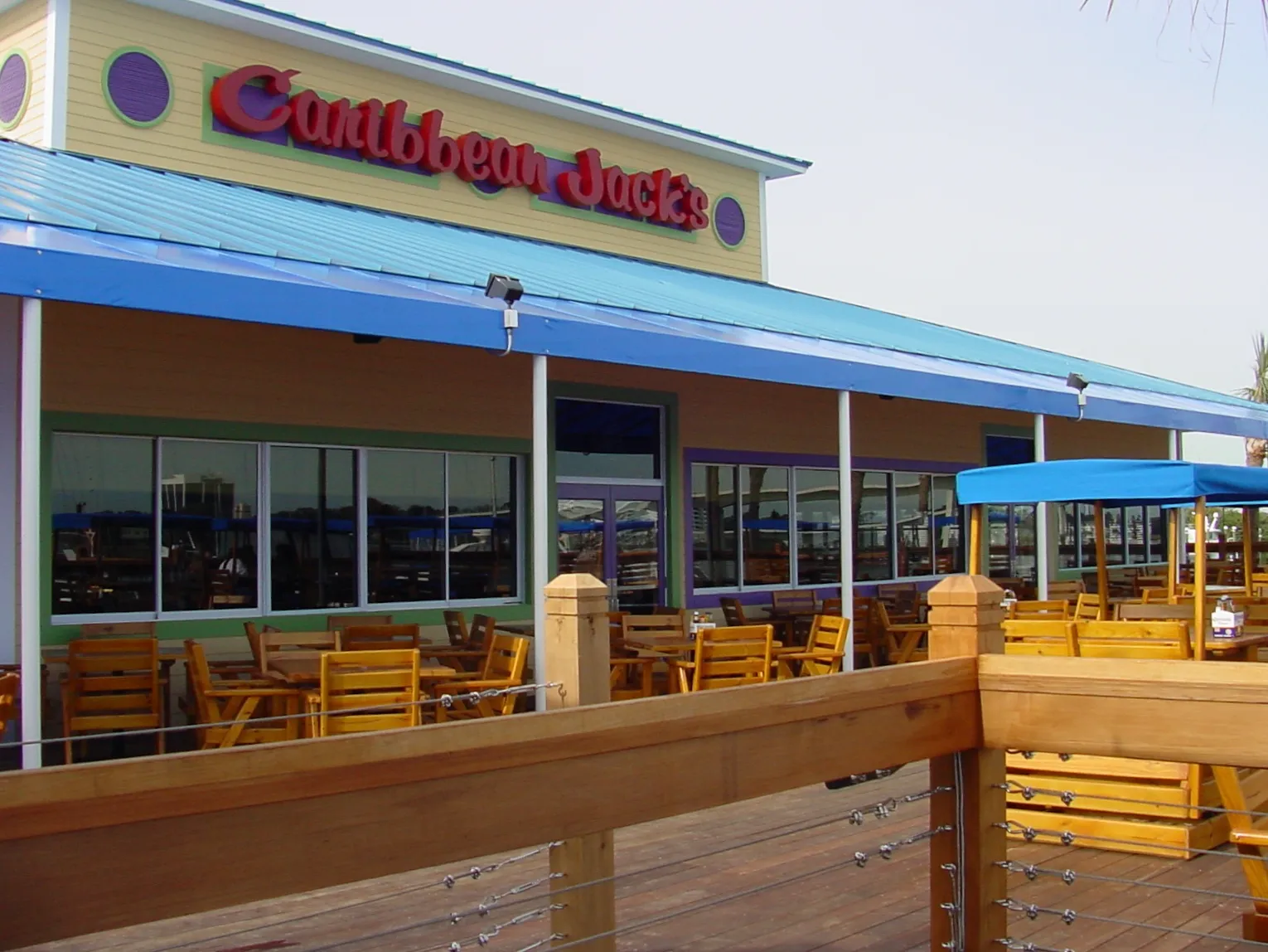 Daytona Beach Caribbean Jack’s outdoor deck restaurant sitting with Tiki bar by top Florida architect Benjamin P. Butera