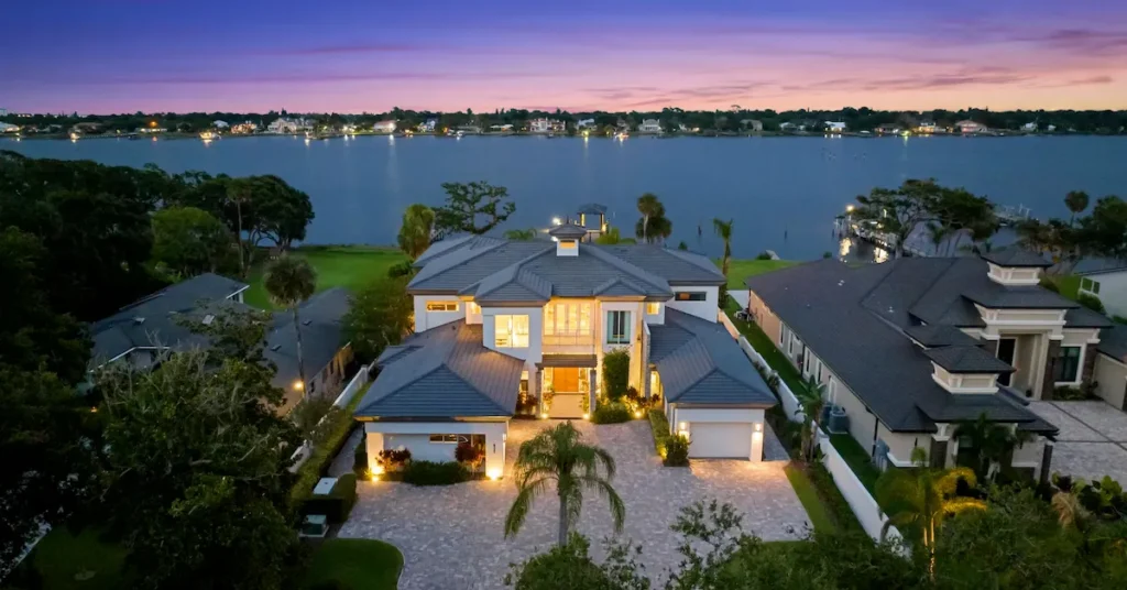 Riverfront luxury home designed by Ormond Beach architect Benjamin P. Butera, a 2024 top 3 selling home in Volusia County